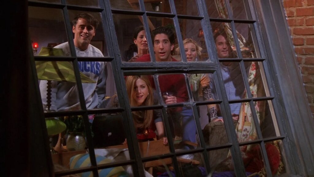 Personajes de 'Friends' mirando por la ventana