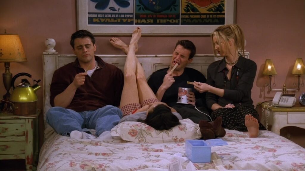 Escena de 'Friends' en una cama