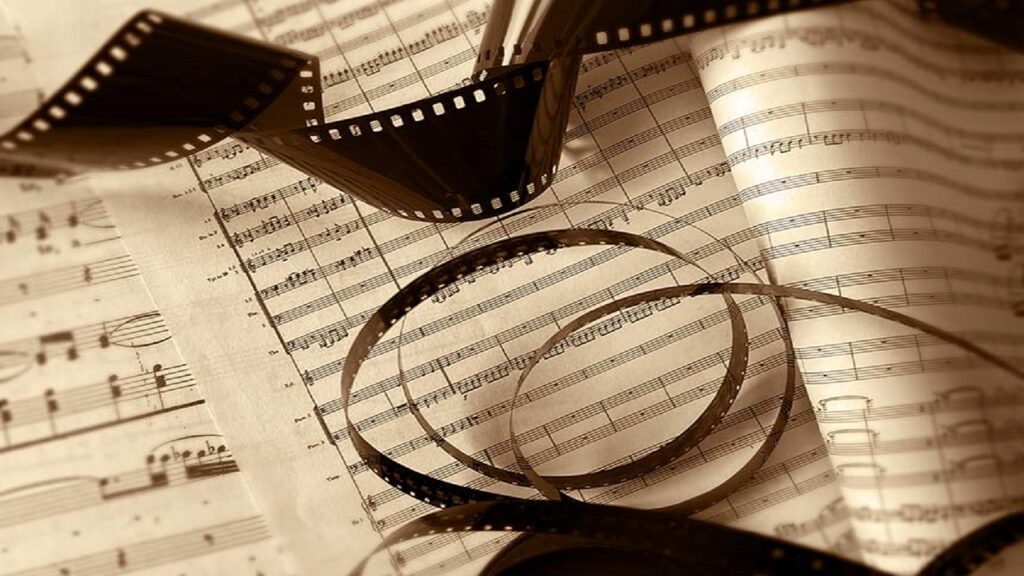Partitura y rollo de película