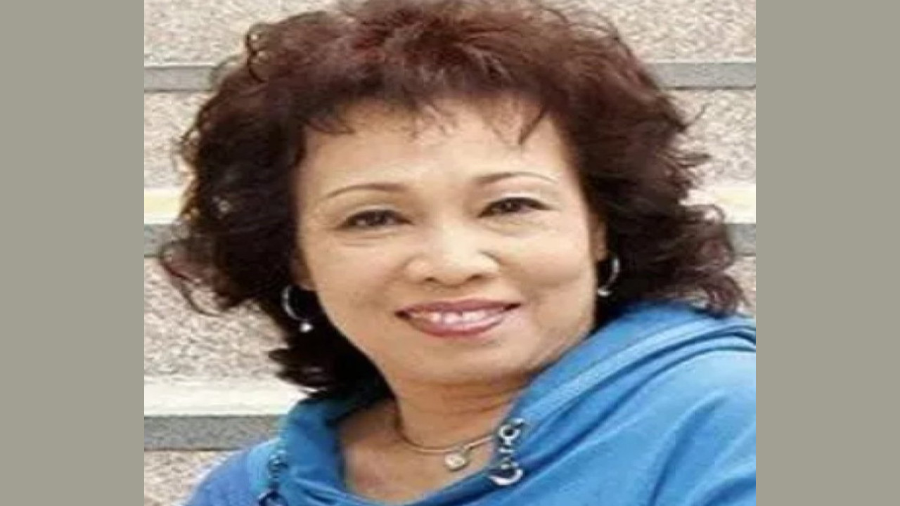 Hui Si-Man (Presentadora)